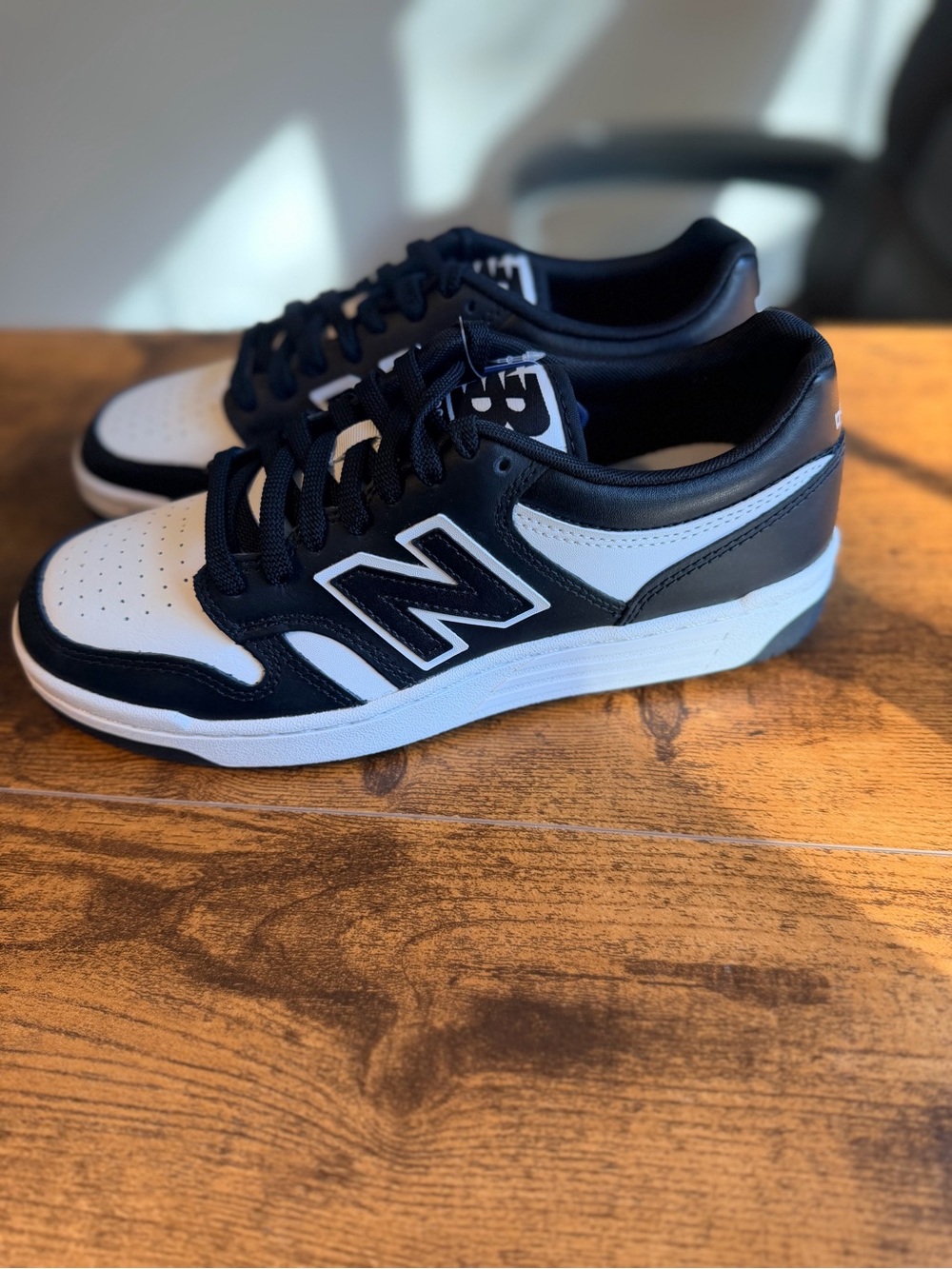 New Balance Black and White Leather Sneakers 7M/8.5W